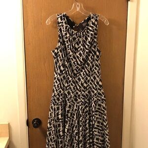 Beautiful Dress, sleeveless, Flared Skirt, with a Bow in the Front